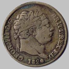 A close-up of a coin

Description automatically generated