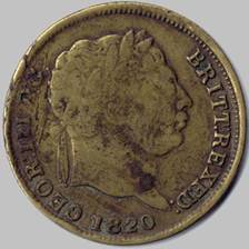 A close-up of a coin

Description automatically generated