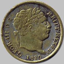 A close-up of a coin

Description automatically generated